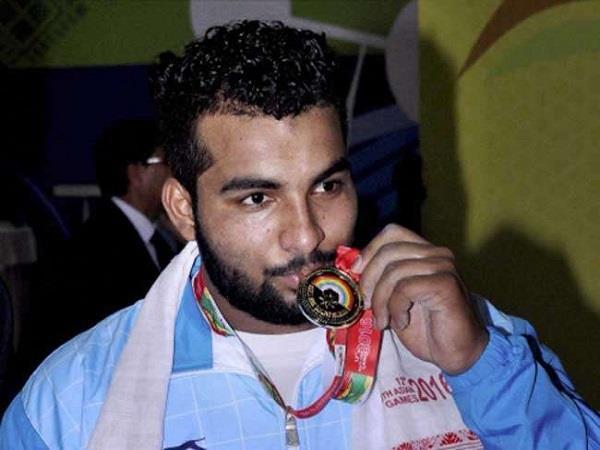 Indian weightlifter Pardeep Singh - Sakshi Post