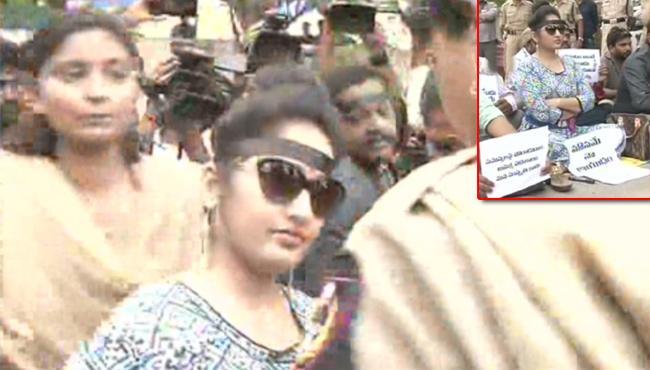 Actress Madhavi Latha being taken away by police - Sakshi Post