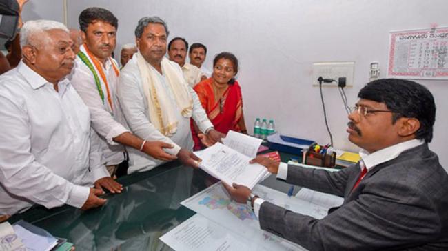 Karnataka Chief Minister Siddaramaiah, who is contesting the upcoming polls from Chamundeshwari constituency, filing his nomination in Mysuru - Sakshi Post