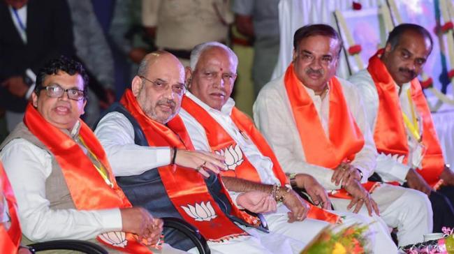 Bharatiya Janata Party chief Amit Shah with Karnataka party president BS Yeddyurappa and Union minister Ananth Kumar - Sakshi Post