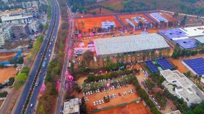 The event has turned Hyderabad into a pink city thanks to the TRS flags that dot the roads leading up to the venue - Sakshi Post