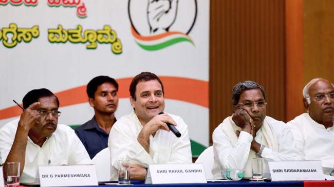 Congress President Rahul Gandhi at a press conference in Bengaluru - Sakshi Post