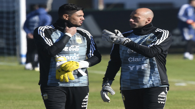 Argentina goalkeeper Sergio Romero with teammate Wilfredo Caballero - Sakshi Post