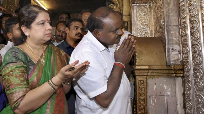 Kumaraswamy and his wife went on temple hopping before taking oath Kumaraswamy and his wife went on temple hopping before taking oath - Sakshi Post