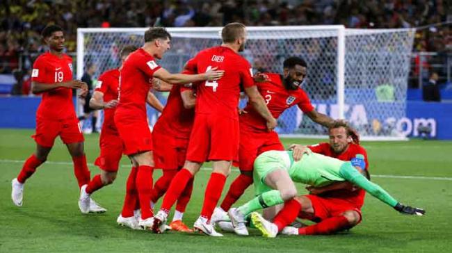 England edged Colombia 4-3 on penalties to halt a run of five successive shootout defeats at major tournaments and book a quarter-final clash against Sweden - Sakshi Post