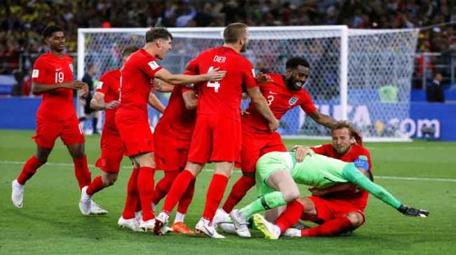 England edged Colombia 4-3 on penalties to halt a run of five successive shootout defeats at major tournaments and book a quarter-final clash against Sweden England edged Colombia 4-3 on penalties to halt a run of five successive shootout defeats at major tournaments and book a quarter-final clash against Sweden - Sakshi Post