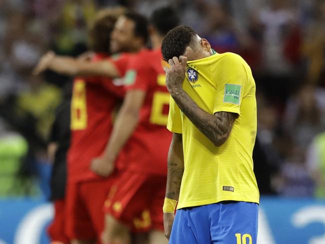 Brazils Neymar reacts as Belgium players celebrate after Brazil is knocked out by Belgium following their quarterfinal match at the 2018 soccer World Cup in the Kazan Arena, in Kazan, Russia &amp;amp;nbsp; - Sakshi Post