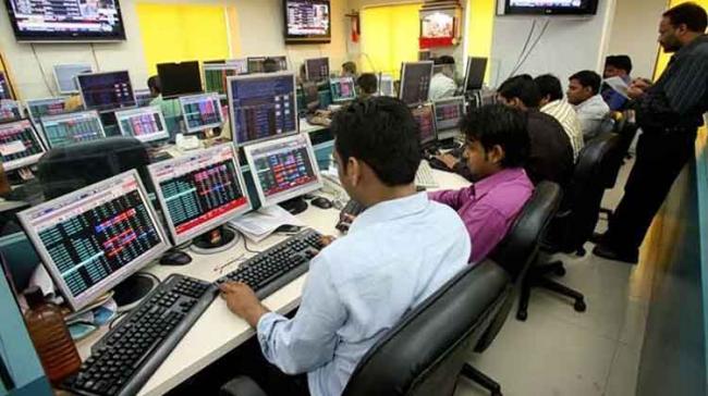 Investors were also awaiting US Federal Reserve Chairman Jerome Powell’s first congressional testimony for hints on the pace of interest rate hikes Investors were also awaiting US Federal Reserve Chairman Jerome Powell’s first congressional testimony for hints on the pace of interest rate hikes - Sakshi Post