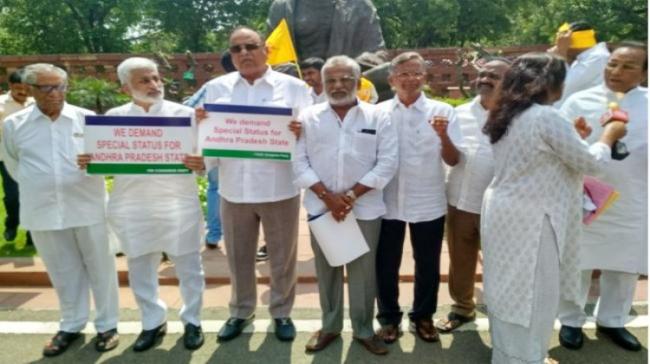 YSRCP MPs staging protest near Parliament - Sakshi Post