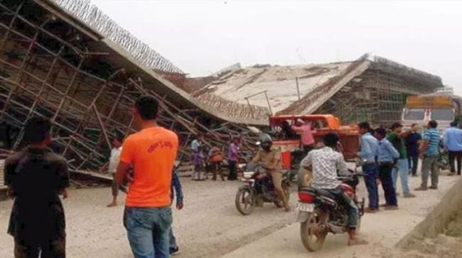 A labourer was injured when a slab of an under-construction flyover of National Highways Authority of India collapsed at Phutaiyya Chauraha in Basti district - Sakshi Post