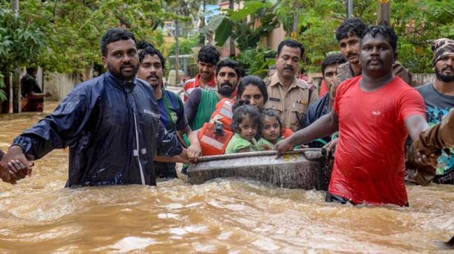 NDRF teams and ordinary fishermen with their motor boats on Friday launched a massive rescue operation in Kerala - Sakshi Post