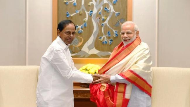 KCR with Narendra Modi - Sakshi Post