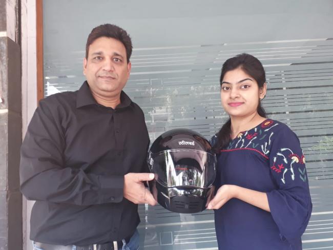 Steelbird Helmets distributing printed helmets - Sakshi Post