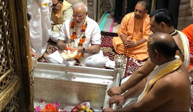 Narendra Modi signed off his 68th birthday with a visit to the famous Shiva temple Kashi Vishwanath - Sakshi Post