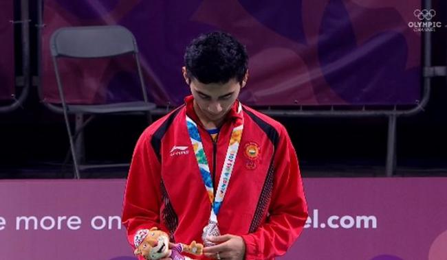 Promising Indian shuttler Lakshya Sen settled for a silver medal after he lost the men’s singles summit clash against Li Shifeng of China - Sakshi Post
