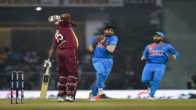 India’s  Jasprit Bumrah takes a catch to dismiss West Indies batsman K Pollard - Sakshi Post