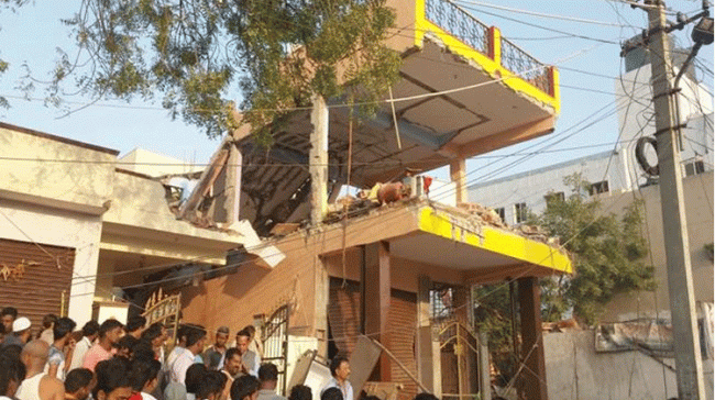 House damaged in the blast - Sakshi Post