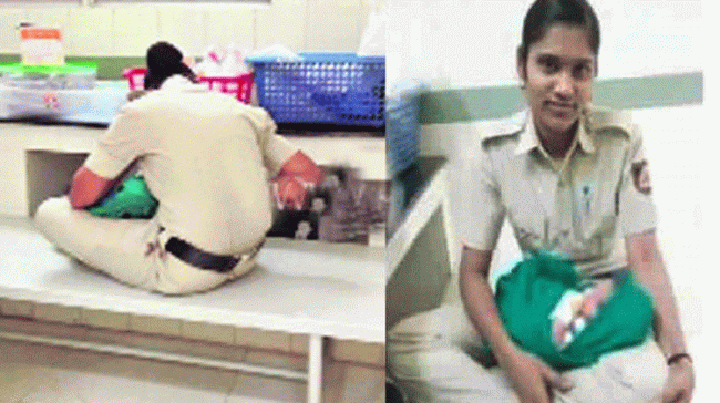 Lady constable Sangeetha breastfeeding the baby - Sakshi Post