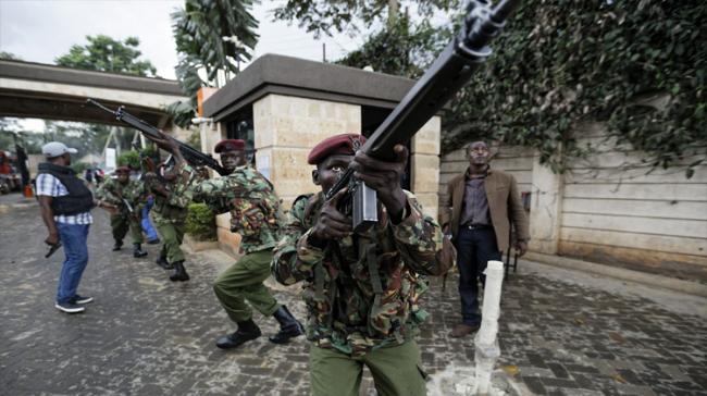 Kenyan Security forces aim their weapons up at buildings&amp;amp;nbsp; - Sakshi Post