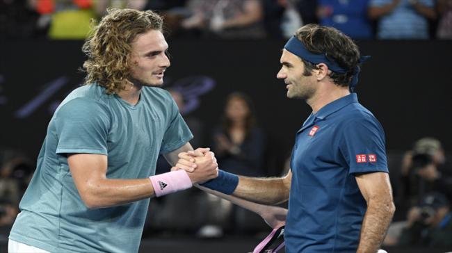 Roger Federer congratulating  Stefanos Tsitsipas after winning their fourth round match - Sakshi Post