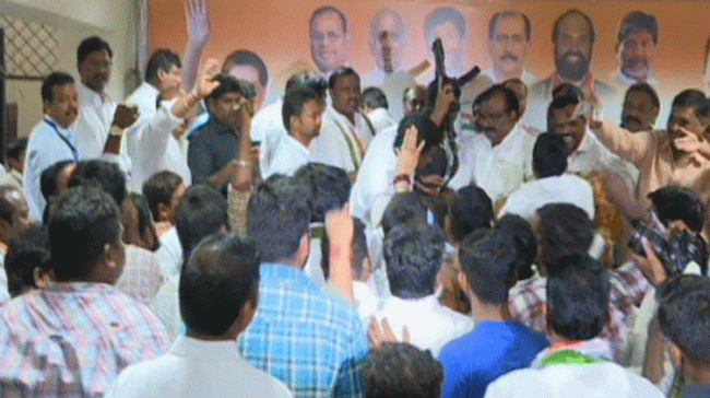 Congress supporters involved in a fight - Sakshi Post