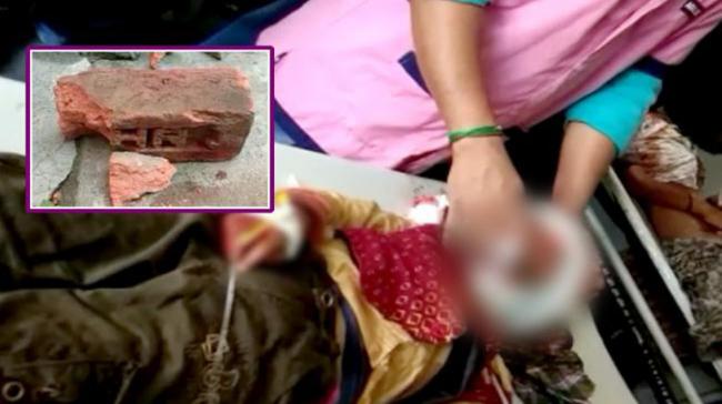 The woman thrashed her two children with bricks - Sakshi Post