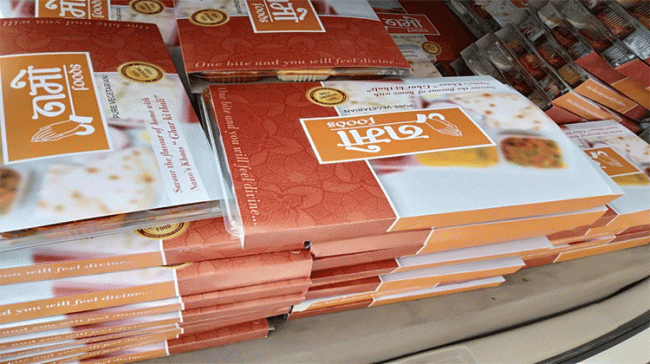 Saffron-coloured food packets with ‘NaMo foods printed on them - Sakshi Post
