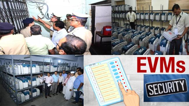 Officials inspecting EVMs in the Strong room - Sakshi Post