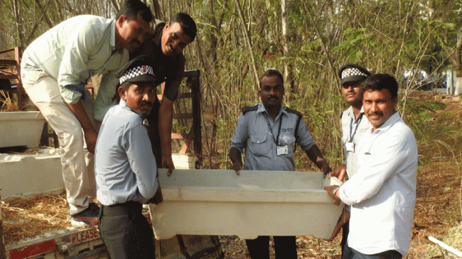 Arranging Water tubs for the wild life in the UoH campus. - Sakshi Post
