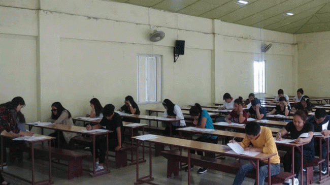 Applicants at the entrance exam - Sakshi Post