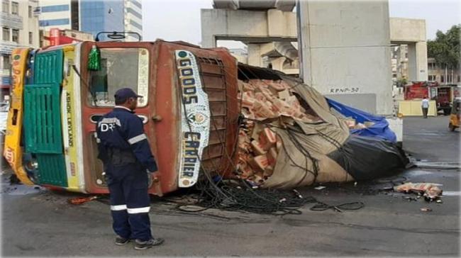The truck loaded with cartons of beer bottles turned turtle near Begumpet The truck loaded with cartons of beer bottles turned turtle near Begumpet - Sakshi Post