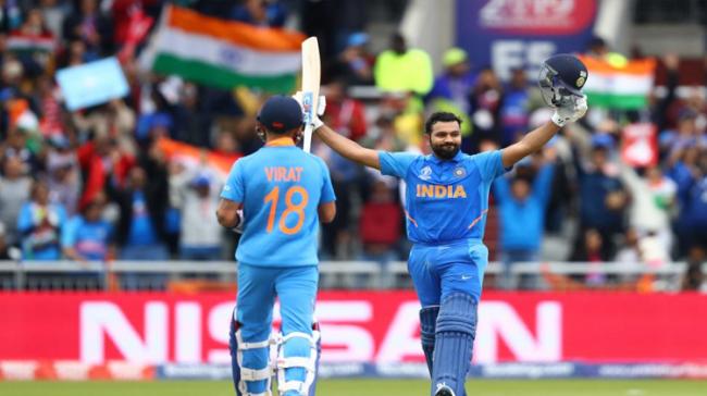 Opener Rohit Sharma hammered a century while Virat Kohli hit 77 as India put on board a challenging 336 for five against Pakistan - Sakshi Post