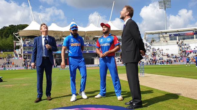 India skipper Virat Kohli won the toss and elected to bat against Afghanistan in their World Cup encounter - Sakshi Post
