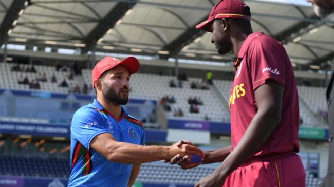 West Indies skipper Jason Holder won the toss and elected to field against Afghanistan in their last league match of the World Cup - Sakshi Post