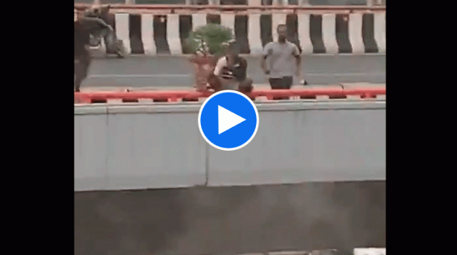 Watch Man attempt to jump off PVNRI Express way - Sakshi Post