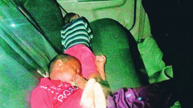 The kids shown lying lifeless in the car. The kids shown lying lifeless in the car. - Sakshi Post