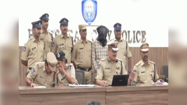 Police With The Accused At Press Conference (Picture Courtesy: ANI)&amp;amp;nbsp; - Sakshi Post