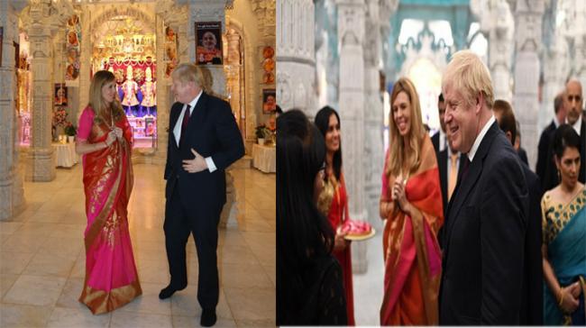 Carrie Symonds with her boyfriend UK Prime Minister Boris Johnson in a temple visit - Sakshi Post