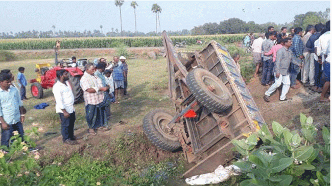 Overturned tractor at the scene of accident - Sakshi Post