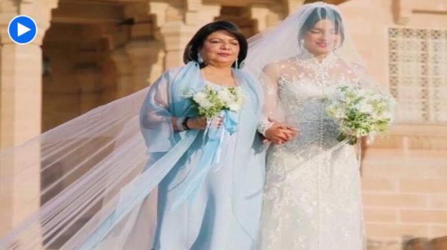 Priyanka Chopra Jonas with her mother on her wedding day Priyanka Chopra Jonas with her mother on her wedding day - Sakshi Post