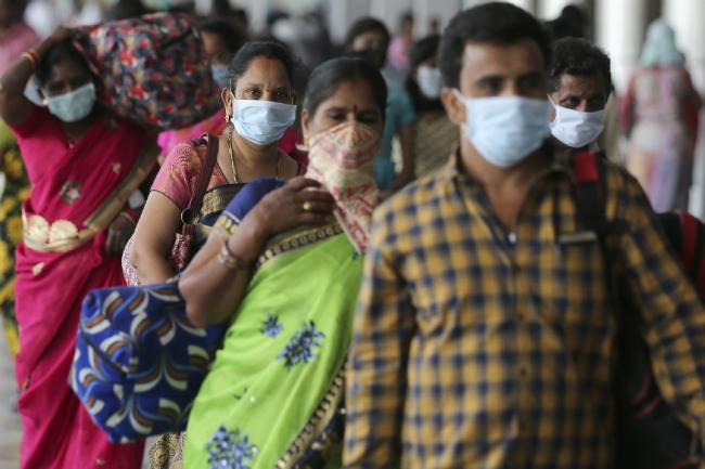 People wearing masks to prevent the contract of Coronavirus - Sakshi Post
