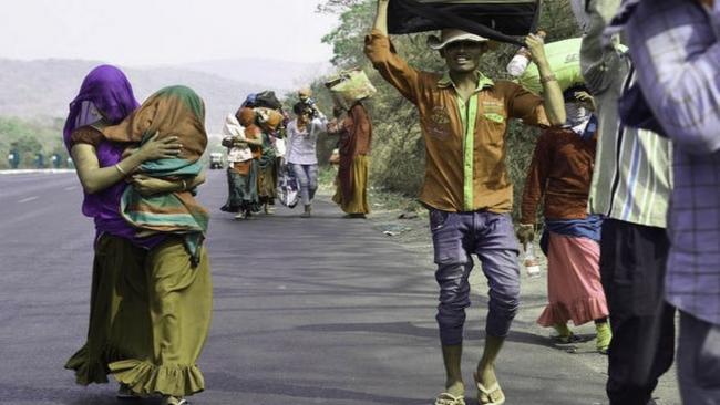 Migrants on road (File Image) - Sakshi Post