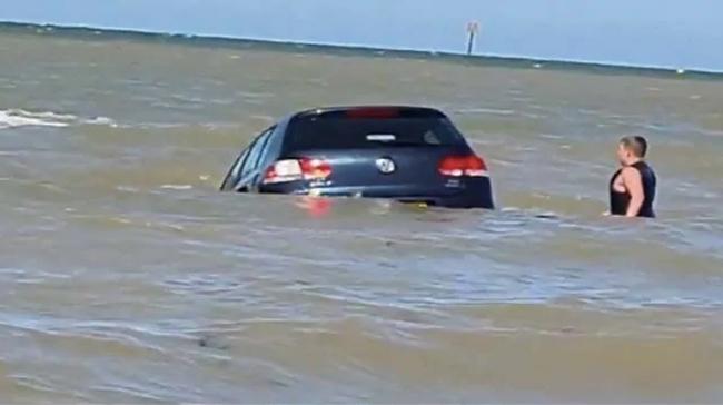 Man battling to save his half-sunk car in Kent, UK - Sakshi Post