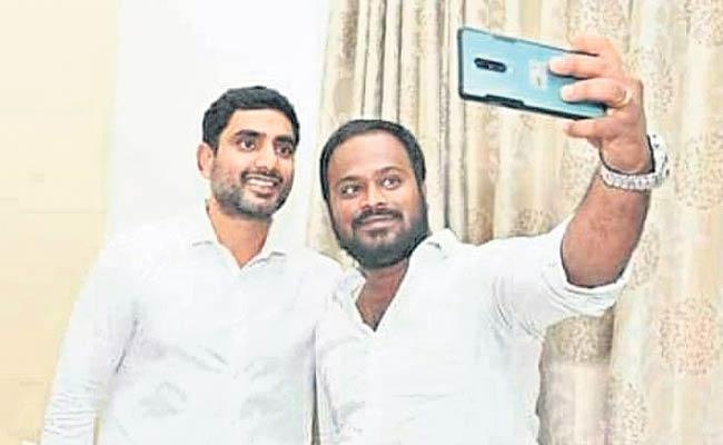 File Pic: Harikrishna taking selfie with Nara Lokesh Chittoor: TDP 'Youth' Leader Arrested For Ganja Smuggling - Sakshi Post
