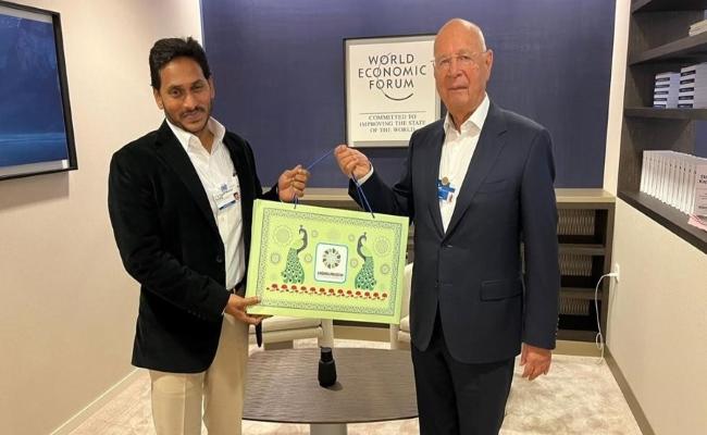 AP Chief Minister YS Jagan Mohan Reddy with WEF Founder-Chairman Klaus Schwab ahead of Davos Summit on Sunday. -Sakshi Post