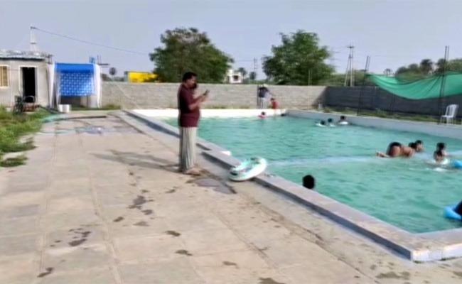 Suryapet: Woman Shocked To Find Secret Camera in Private Swimming Pool Bathroom - Sakshi Post