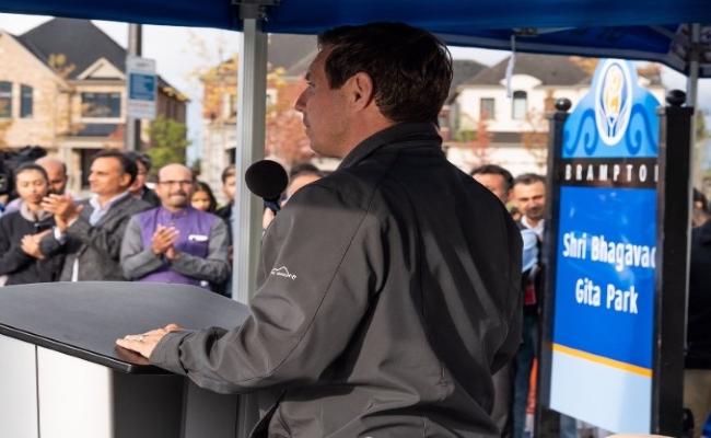 Mayor of Brampton Patrick Brown unveiling the renaming of Brampton's Troyers Park to Shri Bhagavad Gita Park on Wednesday. Photo Credit: (@patrickbrownont via Twitter) - Sakshi Post