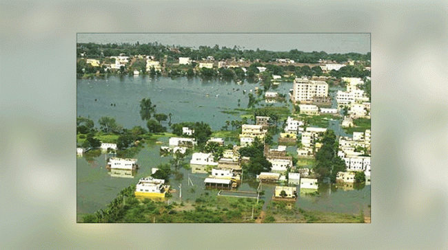 Chief Minister Y S Jaganmohan Reddy took an aerial survey of the flood affected region Chief Minister Y S Jaganmohan Reddy took an aerial survey of the flood affected region - Sakshi Post
