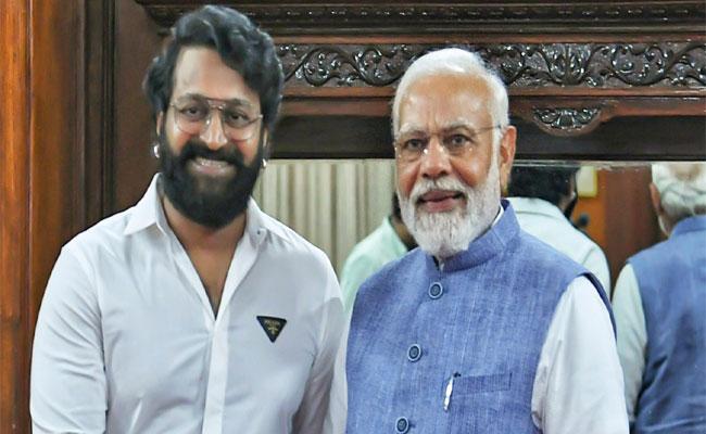 Rishab Shetty With PM Narendra Modi | Source RishabShetty Twitter a/c Yash, Rishab Shetty, Shraddha Jain meet PM Narendra Modi In Bengaluru - Sakshi Post