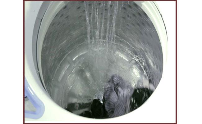 Image used for representational purpose only Baby who fell into washing machine for 15 minutes, survives - Sakshi Post